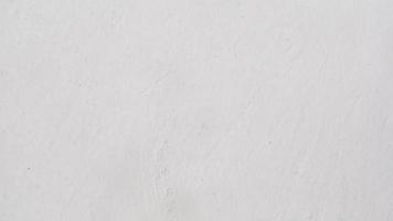 texture of concrete wall with white paint as background photo
