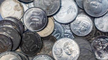 pile of rupiah coins as background photo