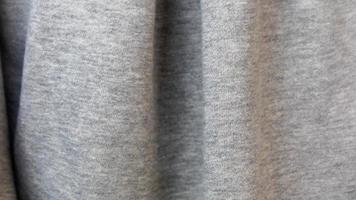 the gray cotton fabric texture as background photo