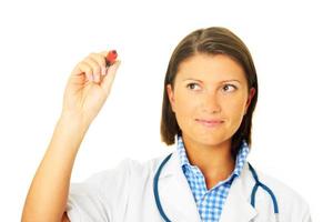 Young female doctor with stethoscope photo