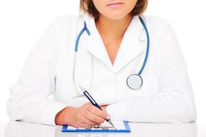 Young doctor with stethoscope photo