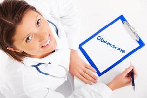 Young doctor with stethoscope photo