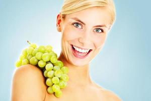 Woman with fruits for wellness concept photo