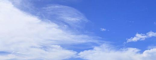 Image of a partly cloudy and partly clear sky during the day photo