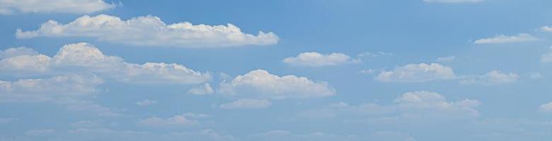 Image of a partly cloudy and partly clear sky during the day photo