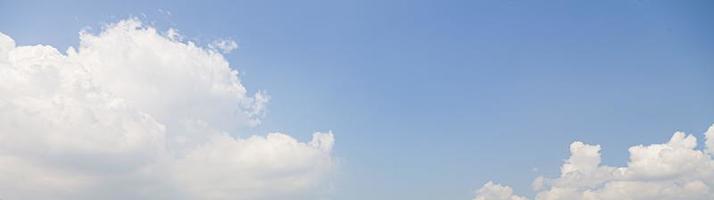 Image of a partly cloudy and partly clear sky during the day photo