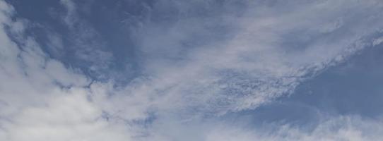 Image of a partly cloudy and partly clear sky during the day photo