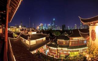 Panoramic image of Shanghai Pudong district skyline from the historic city center at night photo