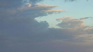 Image of a partly cloudy and partly clear sky during the day photo
