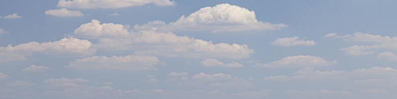 Image of a partly cloudy and partly clear sky during the day photo