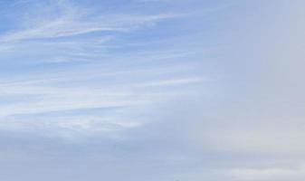 Image of a partly cloudy and partly clear sky during the day photo