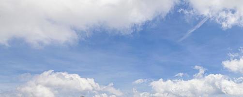 Image of a partly cloudy and partly clear sky during the day photo