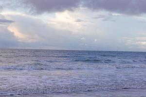 Picture of a wind farm in stormy north sea photo