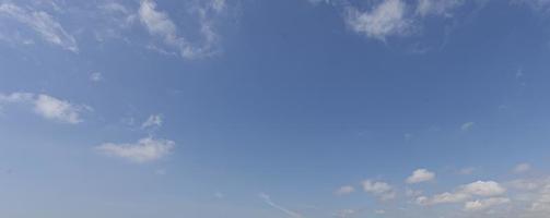 Image of a partly cloudy and partly clear sky during the day photo