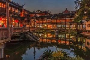 Photo taken from the Yu Garden with a modern skyscraper