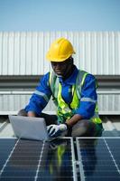 Engineer in charge of solar panel installation The installation of solar energy photo