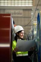 Portrait of a heavy equipment female engineer from a huge industry photo