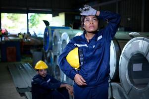 A group of heavy equipment engineers from large industries is taking a break photo