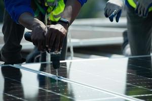 Engineer in charge of solar panel installation The installation of solar energy photo