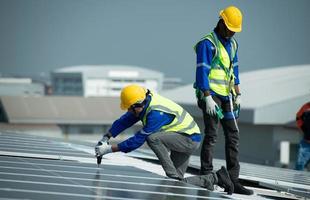 Engineer in charge of solar panel installation The installation of solar energy photo