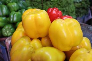 red and yellow capsicum stock photo