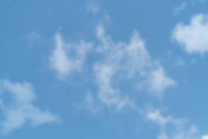 blue sky and white cloud blurred background photo