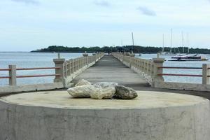 Symmetrical photograph of a pier bridge from the front view. photo