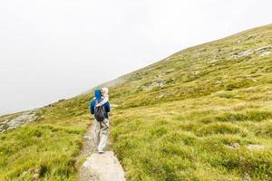 hiking with children in the mountains photo