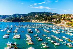 Aerial view of small yachts and fishing boats in Lerici town, located in the province of La Spezia in Liguria, part of the Italian Riviera, Italy. photo