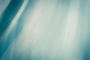 Stylish background in the form of an abstract curtain in turquoise colors photo