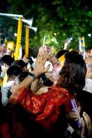 1st July 2022, Kolkata, West Bengal, India. Devotees blowing Conch During Kolkata Iskcon Rath Yatra photo