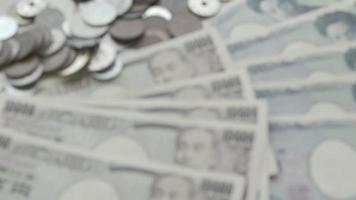 billets en yen japonais et pièces en yen japonais pour fond de concept d'argent. concept de sauvegarde. video
