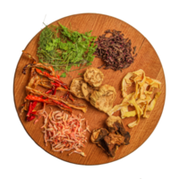 Dried vegetables on a wooden cutting board. Food crisis concept. Preparations from healthy dried vegetables. png