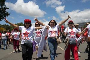 Brasilia, Brazil Jan 1 2023 Crowds of People Heading down the Esplanada towards the National Congress for the Inauguration of President Lula in Brasilia photo