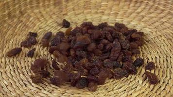 Brown raisins in a basket. Diet healthy food. video