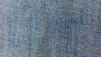 Blue jeans texture as a background photo