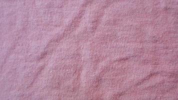 pink cloth texture as background photo