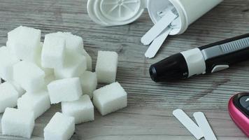 Diabetes testing. Sugar cubes on the table. video