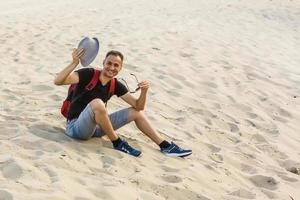 man resting in the desert photo