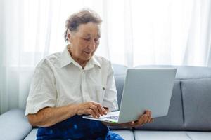 Senior businesswoman working in the office photo