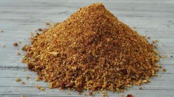 Pile of gyros kebap spices mix isolated. Blended pita kebab red spice powder with seasoned salts, grounded oregano, paprika, cumin, pepper, salt, saffron, coriander and basil video