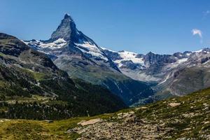 Amazing view of touristic trail near the Matterhorn in the Swiss Alps. photo