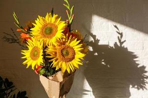 Beautiful sunflowers in a vase photo