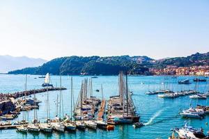 Aerial view of small yachts and fishing boats in Lerici town, located in the province of La Spezia in Liguria, part of the Italian Riviera, Italy. photo