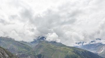 panorama mountains with clouds, switzerland photo