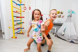 children play in the children's room indoors photo