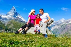 Family on their vacation in mountains photo