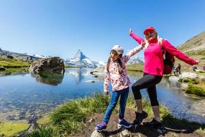 Amazing view of touristic trail near the Matterhorn in the Swiss Alps. photo