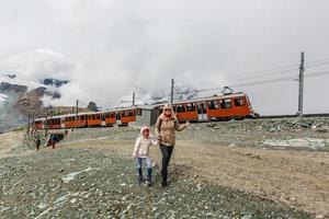 Zermatt, Switzerland -The train of Gonergratbahn running to the Gornergrat station in the famous touristic place photo