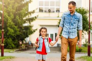 Loving daddy look at little adorable daughter feeling love, profile faces side view, deep devotion warm relationships, love care, closest person, fathers day concept photo